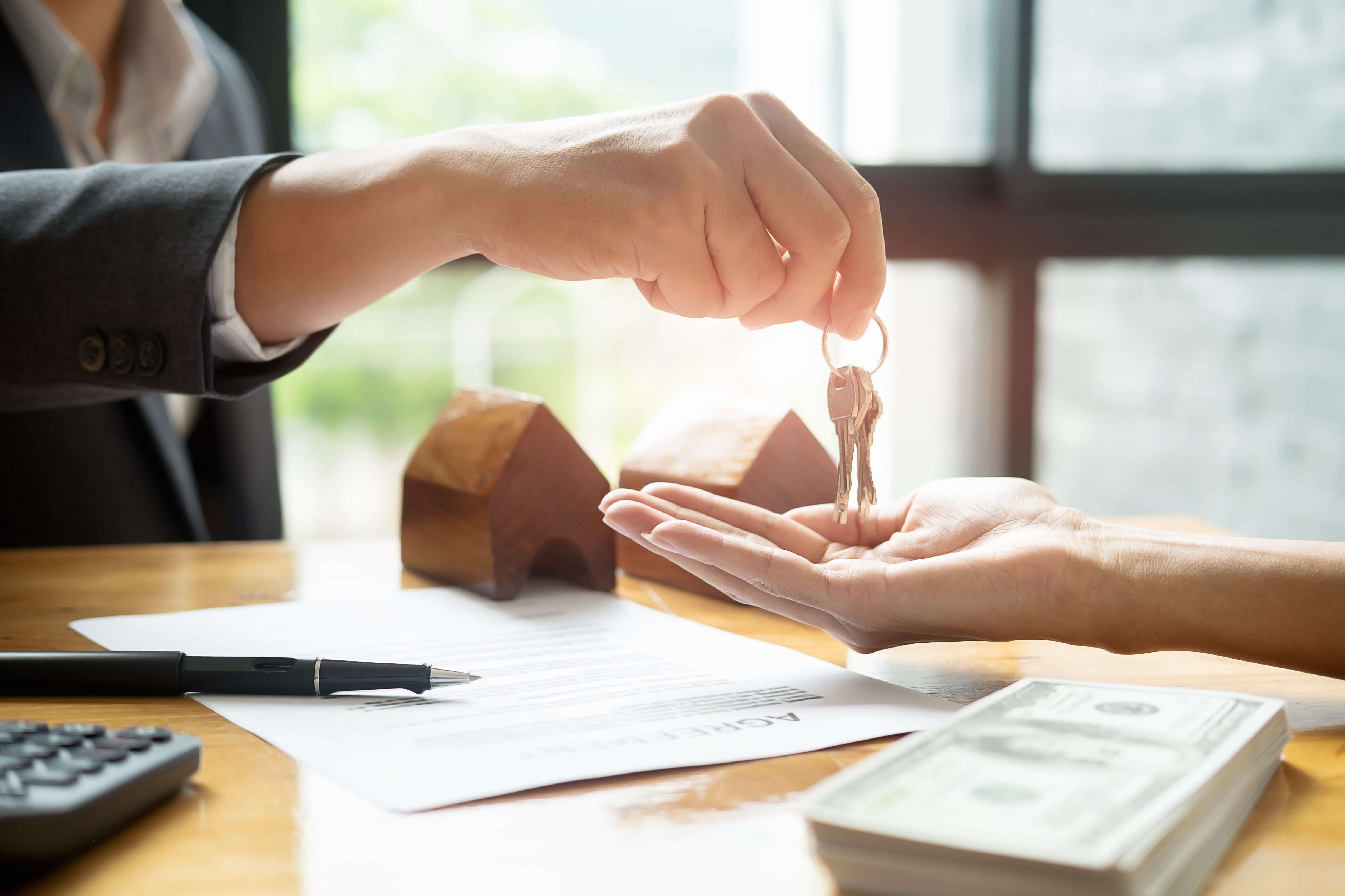 people exchanging keys